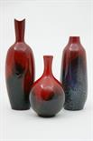 Three Royal Doulton flambe vases, numbered '1603', 19cm; '1614', 15cm and '1606', 12cm