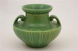 Pilkingtons Lancastrian vase, circa 1905-15, squat amphora shape decorated in a matte green glaze,