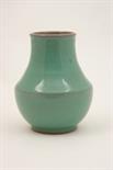 Poole green glazed vase in the Chinese style, circa 1953, baluster form, impressed marks and