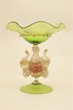 Venetian free blown glass tazza, lime green frilled bowl supported on three swans, slightly tinted