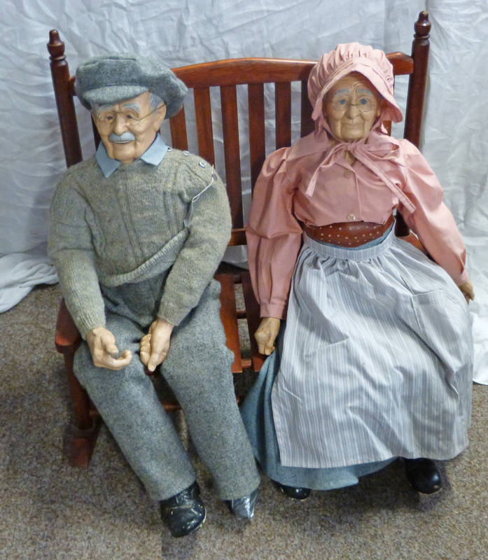 old man and woman ceramic dolls