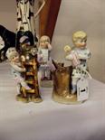 BOEHME & CONTA; Pair of child figure matches striker and similar figure spill vase