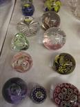 PAPERWEIGHTS; Collection of 17 assorted coloured glass mainly domed paperweights
