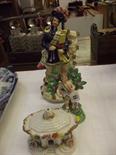 STAFFORDSHIRE POTTERY, Bocage backed putti; also Highland musician figure (restored) and