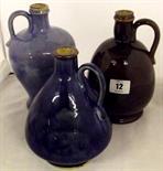 DOULTON STONEWARE; three art glazed stoneware flagons each impressed model No 4884