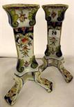 FAIENCE; pair of Faience triple lead support candlesticks decorated in the Rouen style (some