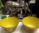 SILVER LUSTRE; pottery silver lustre standing lion with sphere, 12" long; and pair of yellow