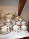 CROWN DERBY; gilt floral bordered and ribbon design part tea service, pattern no. 500, including