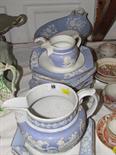 EARLY 19TH CENTURY TABLEWARE, mask lip "Chimera" design relief moulded blue ground milk jug and 1