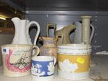 19TH CENTURY TABLEWARE; stoneware daisy design moulded candlestick, three Victorian milk jugs, three