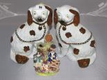 STAFFORDSHIRE POTTERY; pair of mid 19th Century copper lustred seated spaniels with detachable front