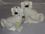 STAFFORDSHIRE POTTERY; pair of late gold lustre seated 9" spaniels
