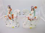 STAFFORDSHIRE POTTERY, pair of mid 19th Century equestrian figures of highland musicians 11" high (