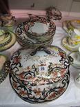 MELROSE STOKE POTTERY, late 19th Century floral and gilded part dinner service, some pieces a/f