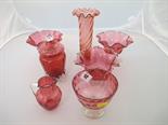 CRANBERRY GLASS, Pair of crinoline edge cranberry glass cream dishes, similar lidded jar and 4 other