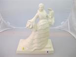 BOCH FRERES KERAMIS, cream ground pottery stylish figure of female dancer by Charles Catteau, 13"
