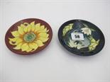 MOORCROFT, "Sunflower" design circular pin dish and similar "Lily" designed dish