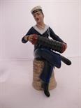 DRESDEN, figurine of a sailor playing a squeezebox