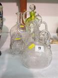 GLASSWARE, three cut glass ewer jugs, thistle shaped green glass decanter and two other pieces