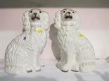 STAFFORDSHIRE POTTERY, pair of 19th Century seated spaniels