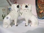 STAFFORDSHIRE POTTERY, Pair of encrusted pottery standing poodle figures 6`` (1 leg a/f)