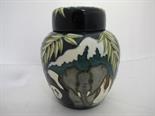 MOORCROFT, ``Giraffe & Zoo`` pattern lidded jar 1995