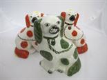 STAFFORDSHIRE POTTERY, green lustre seated spaniel & pair of reproduction seated spaniels