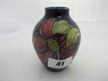 MOORCROFT, ``Hibiscus`` style pattern blue ground posy vase, late Queen Mary label