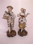 CONTINENTAL PORCELAIN, pair of continental porcelain figures holding cat and puppy