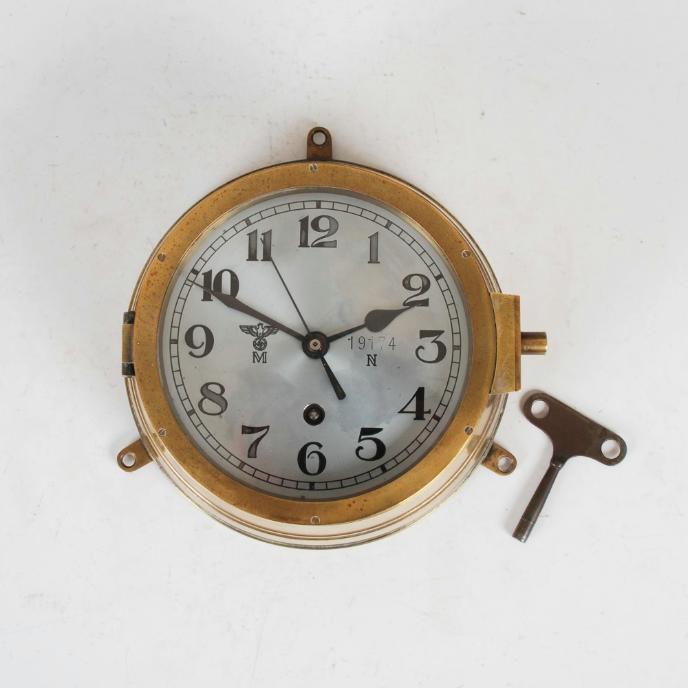 A WWII German Kriegsmarine Uboat eight day bulkhead clock, the 6 1/4