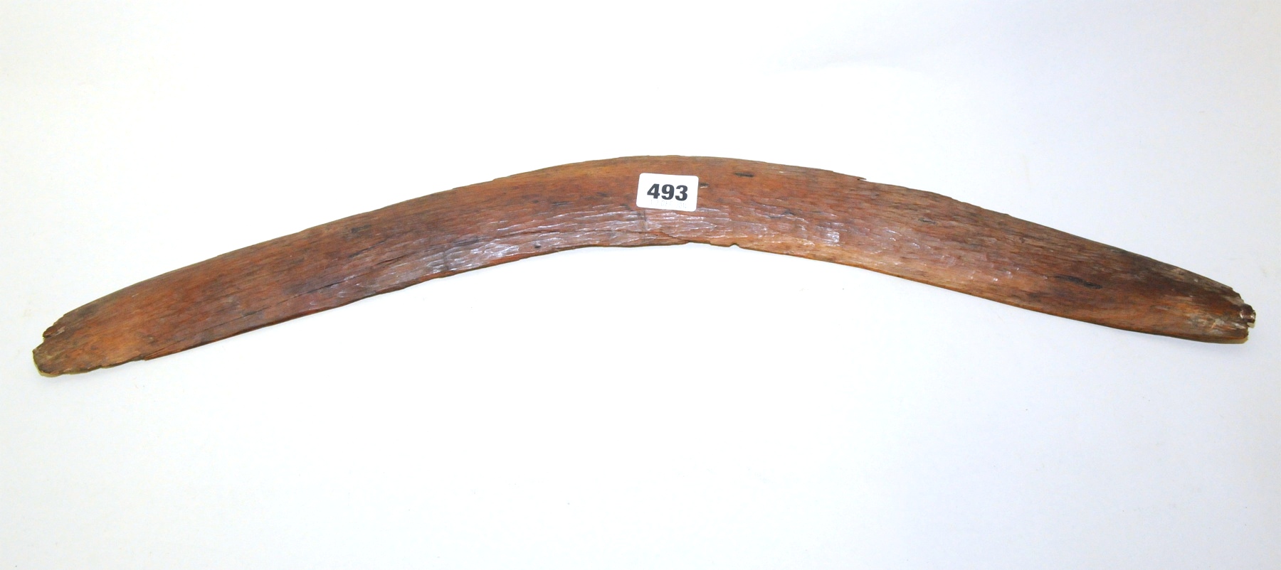 Antique Aboriginal boomerang of plain curved form with natural hewn