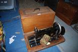 An inlaid wooden cased Sewing machine by Frister & Rossman, Berlin.