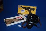 An Akita Royal 1 Camera and flash attachment, and a Diana G4 Air Pistol