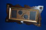 An ornate Photograph Frame to take four photographs  in a wooden frame  23 3/4'' x 13'