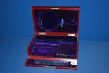 A ladies red leather Dressing box - mirror missing