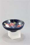 Moorcroft `Anemone` Small Bowl on Blue Background