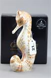 A Boxed Royal Crown Derby Paperweight with gold stopper Swirl Seahorse