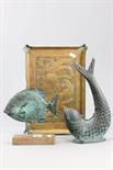 Two Cast Metal Fish Ornaments and a Brass Relief Fish Design Tray