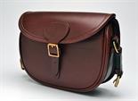 JAMES PURDEY & SONS A NEW AND UNUSED LEATHER SUEDE-LINED CARTRIDGE BAG with canvas and leather