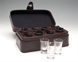 A NEW AND UNUSED BEST QUALITY LEATHER CASED EIGHT SHOT GLASS SET the shot glasses housed in