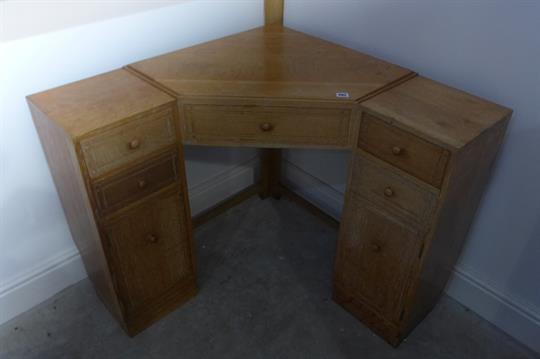 A Heal Son Ltd London Lime Oak Corner Dressing Table With Five