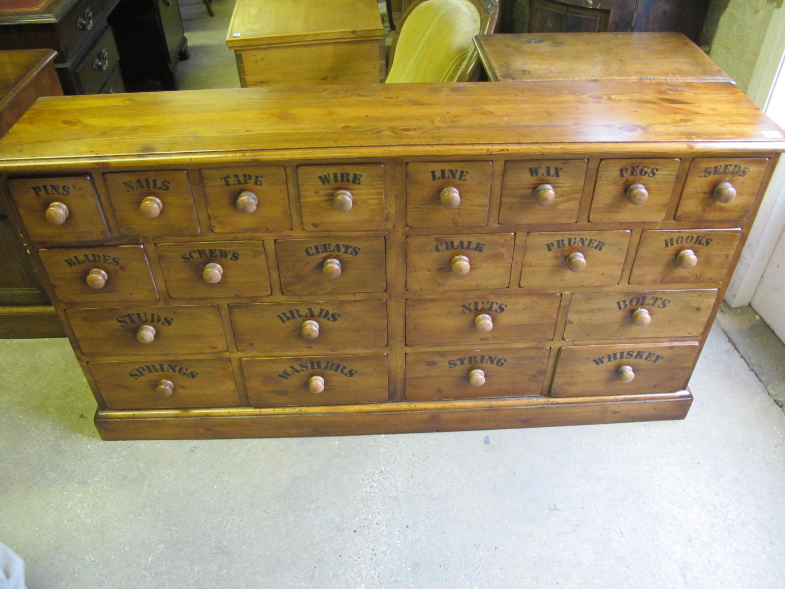 A pine merchants chest with twenty two drawers Height 79 cm x Width