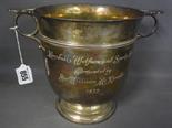 A silver twin handle Trophy cup - Hallmarked Sheffield 1932 - 33 - maker James, Dixon and Son -