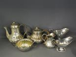 A silver plated four piece teaset, two plated sauce boats and two plated teaspoons
Condition report: