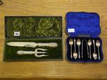 A boxed silver handled seriated edge knife and three prong form in original box and a boxed set of