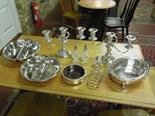 A quantity of assorted silver plate including a pair of three branch candelabra , chafing dishes and