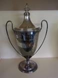 An Impressive twin handled lidded silver Trophy Cup - London 1909/10 - maker B B S Ltd - engraved