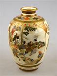 A Japanese Satsuma ovoid vase decorated with two large panels, one with six immortals at leisure,