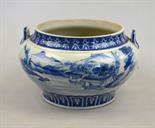 A Chinese blue and white porcelain circular bowl decorated with a riverside village, 20th century,