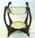 An unusual Chinese folding two tier stand, the cross stretchers carved with calligraphy, the